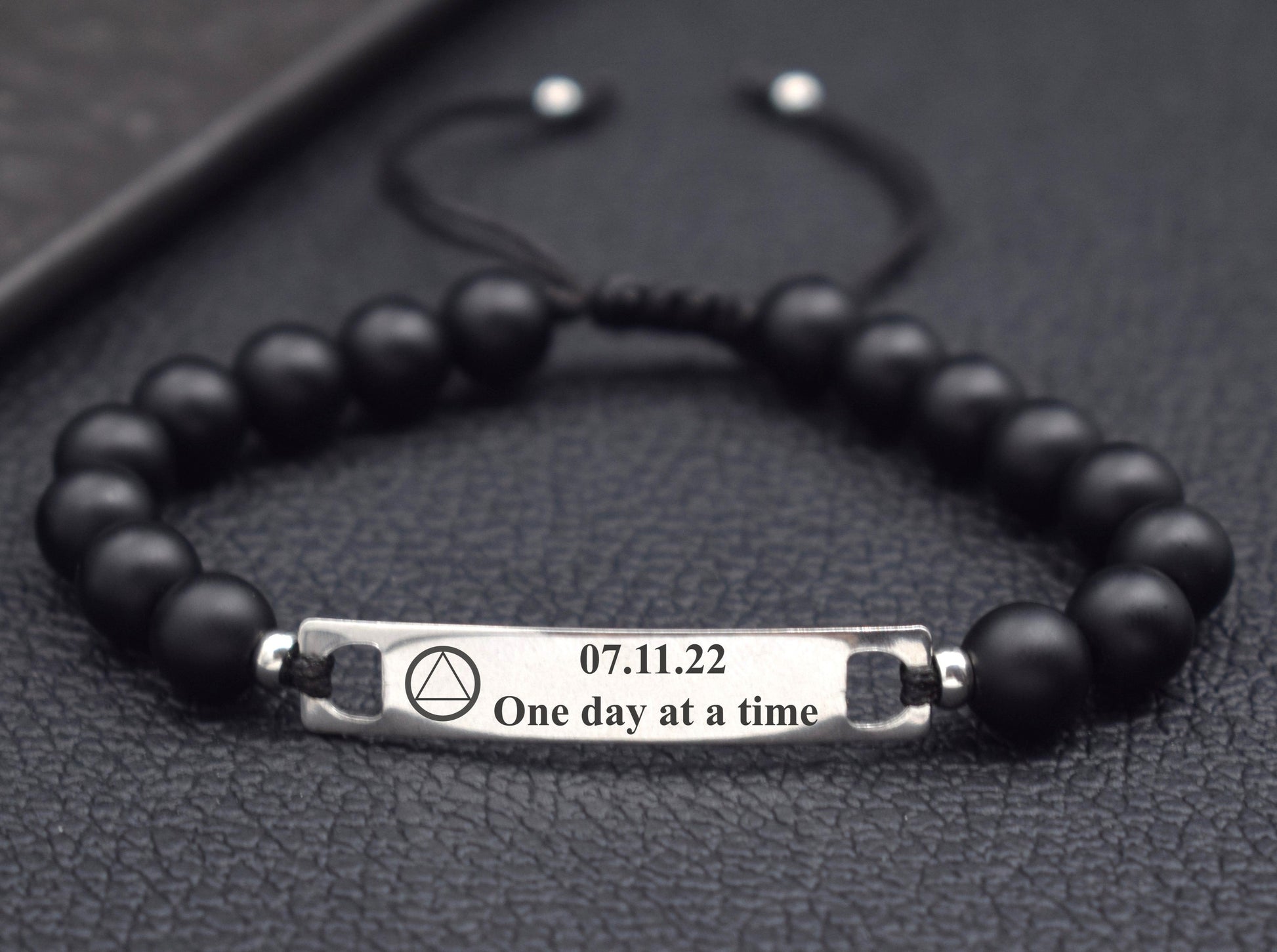 sober bracelet with AA symbol and sobriety date