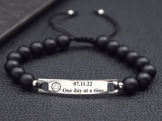 sober bracelet with AA symbol and sobriety date