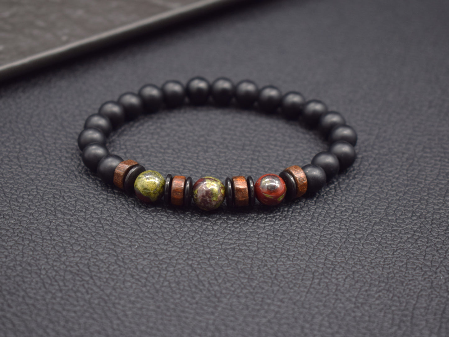 Handmade onyx bracelet with jasper beads and sandal wood beads